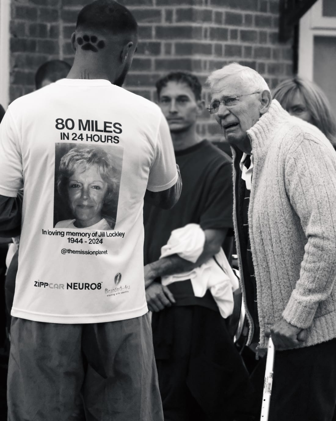 Rohan after running 80 miles for his nana, meeting his granddad.
